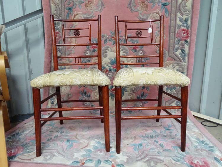 A pair of Arts and Crafts upholstered boudoir chairs CONDITION: Please Note - we do