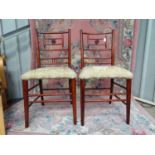 A pair of Arts and Crafts upholstered boudoir chairs CONDITION: Please Note - we do