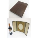 Debenham Gould Bournemouth : A leather cased folding photograph frame with silk and velvet lining