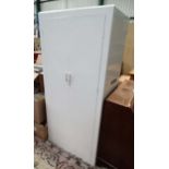 White painted wardrobe , label to back for Bowman Brothers Ltd,