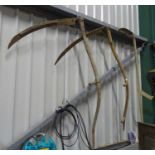 Three scythes,