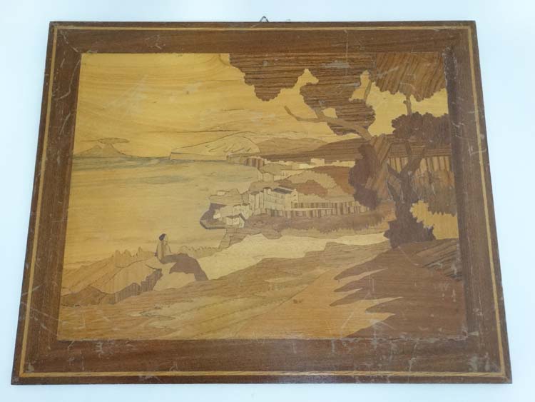 An early 20thC Rowley type wooden topographical parquetry panel depicting a figure near cliffs 12