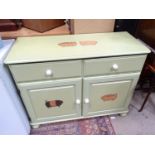 A green painted kitchen sideboard with images of pigs CONDITION: Please Note - we