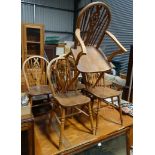 A set of 6 chairs wheel back dining chairs with elm seats (1 carver) CONDITION: