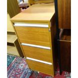 A wood effect filing cabinet This lot is being sold for our nominated charity for the year The