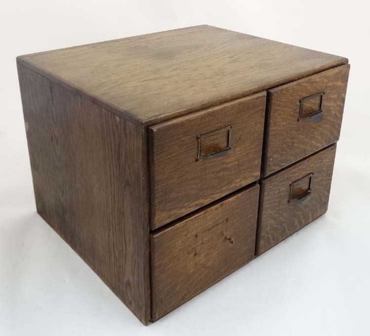 An early 20th C oak four drawer table top filing cabinet, with sliding sections within, - Image 2 of 7