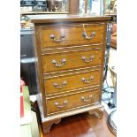 A 4 drawer small chest of drawers CONDITION: Please Note - we do not make reference