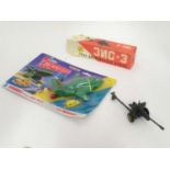 A USSR era Russian field gun and Matchbox Thunderbirds 2 toy in its original package