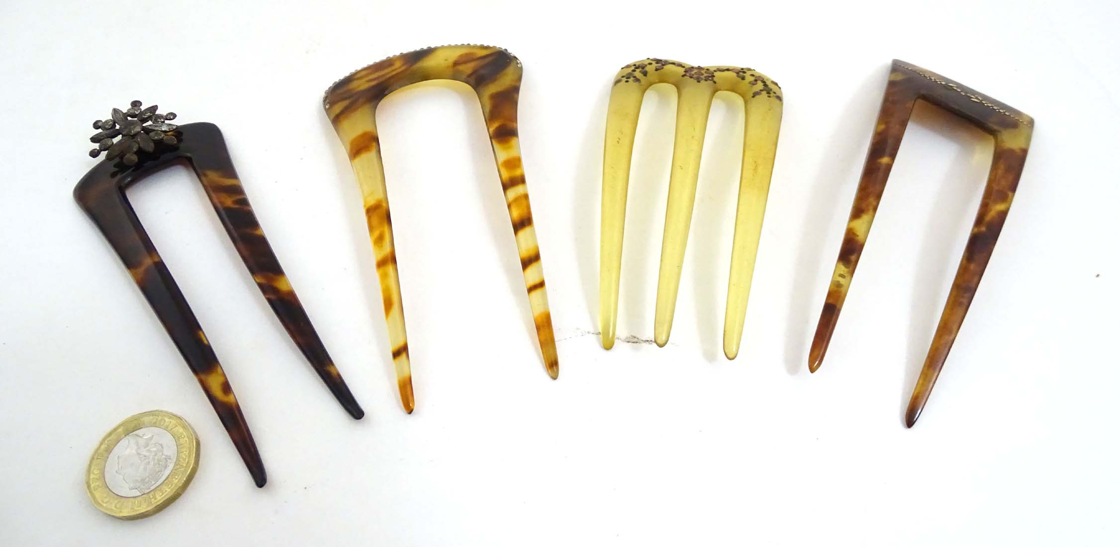 Various tortoiseshell and celluloid hair combs / hair pins / mantillas with cut steel etc