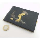 An early 20thC Japanese Amita cigarette case with damascene style decoration depicting a female