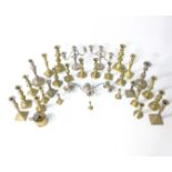 Various candlesticks to include a quantity of 19thC and later ejector candlestick,