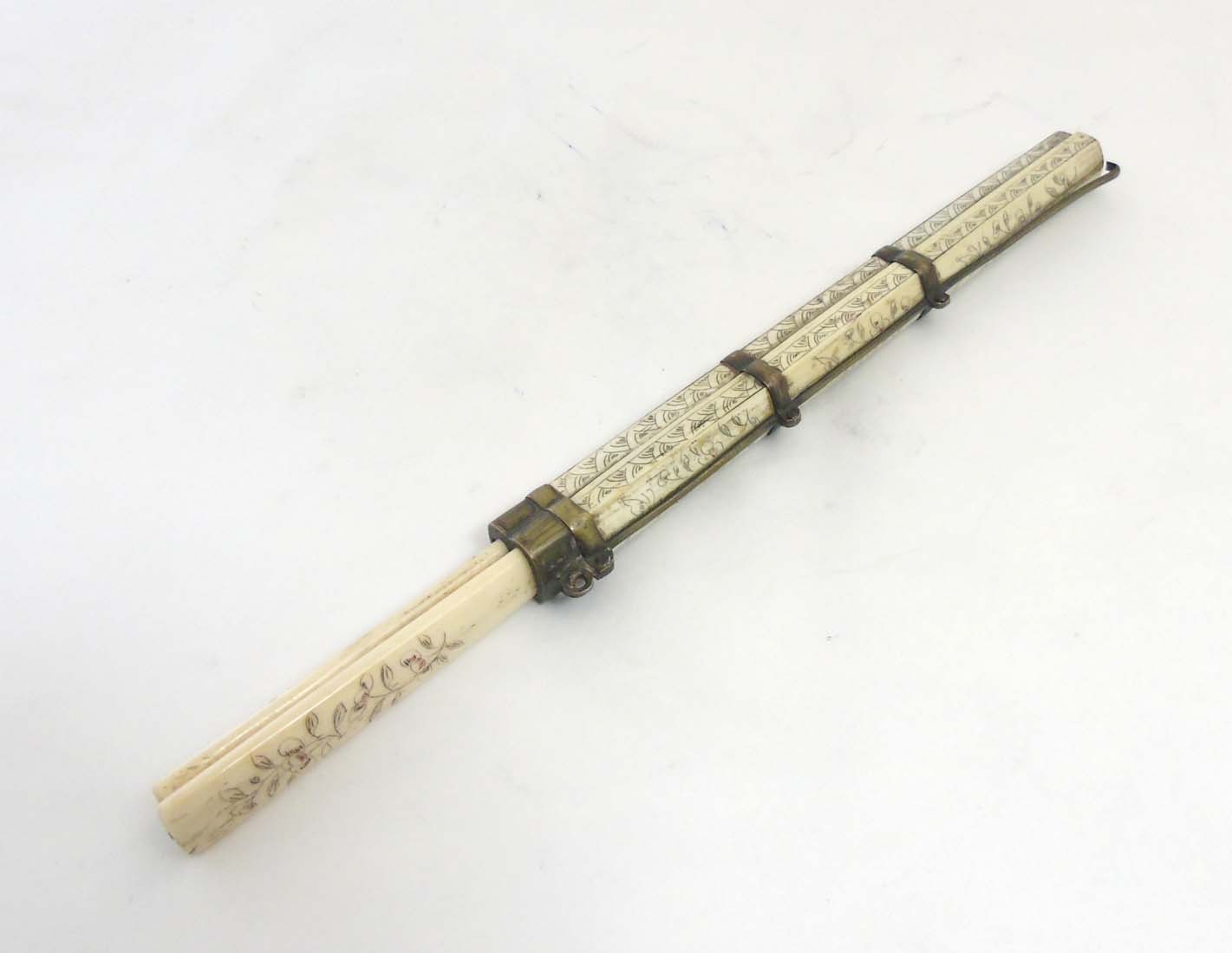 A Meiji period Japanese brass and decorated bone case containing chopsticks and knife handle. - Image 6 of 8