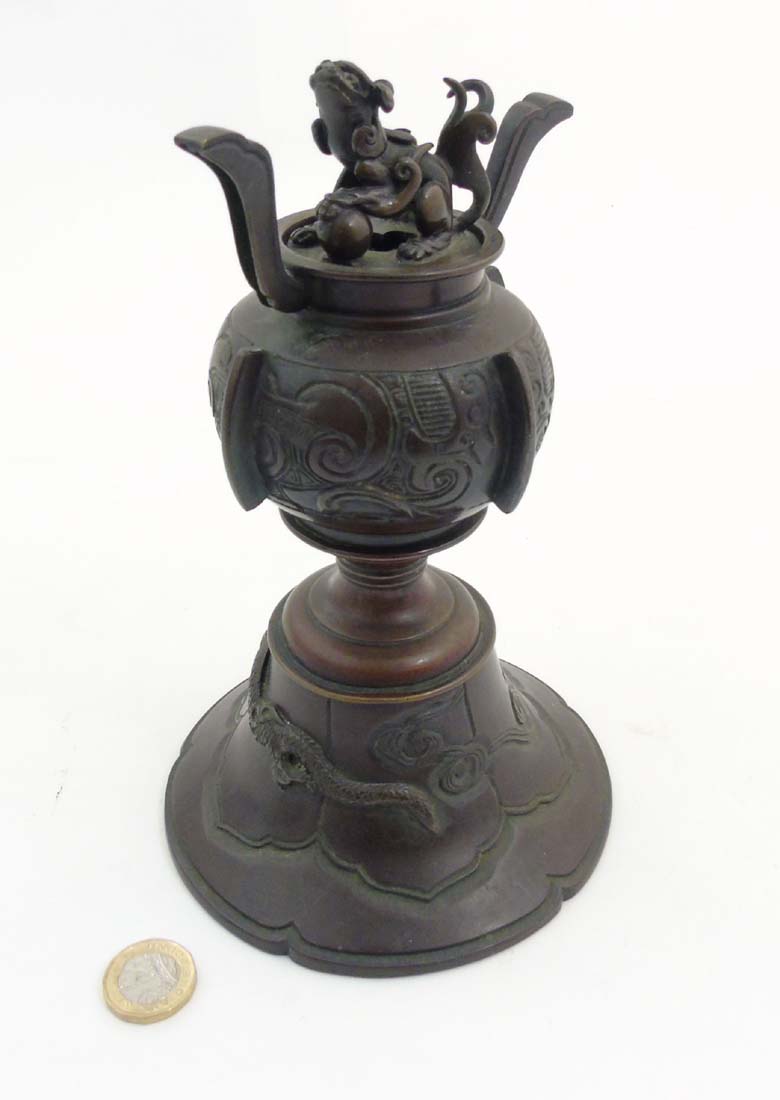 A Chinese patinated bronze coro with bell shaped base hang a four footed dragon in relief - Image 2 of 6