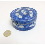 A Chinese blue and white circular lidded inkstone, 3 3/4" diameter,
