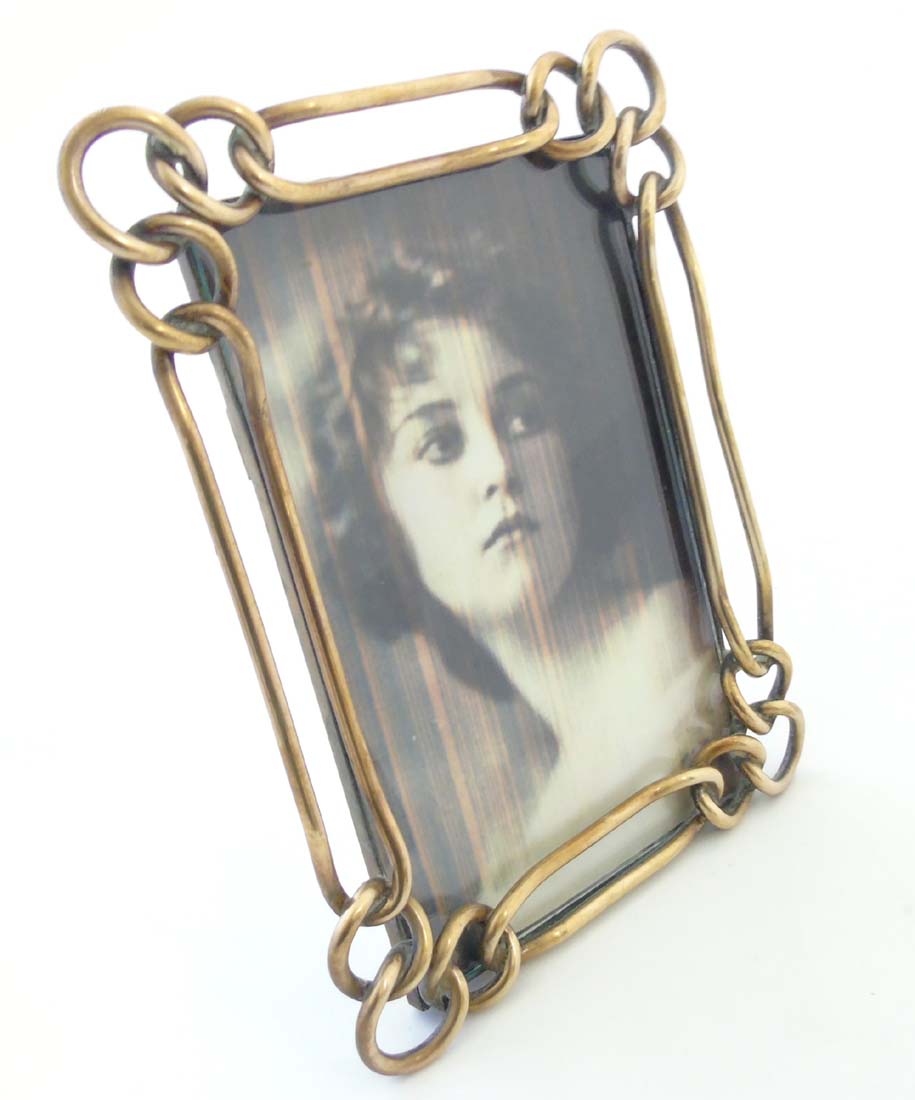 A late Victorian brass chain link photograph frame with easel / strut back. - Image 5 of 7