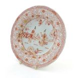 An 18th/19thC Chinese export plate depicting two oriental female figures to centre with trailing