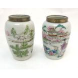 A pair of Chinese famille rose vases with silver rim,