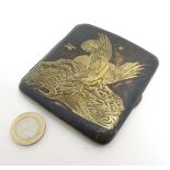 An early 20thC Japanese Amita hip formed cigarette case with damascene style decoration depicting
