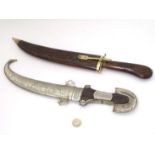 Militaria : A c1900 Eastern Jambiya (Khanjar) dagger, having a curved 9 ½" blade,