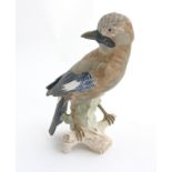 A Goebel bird figurine of a Jay bird in a matte finish, makers mark to base,