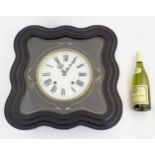 French Vineyard Clock : An 8 day 9 5/8” glass dialled clock , striking on a gong ,