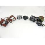 A collection of six vintage 20thC cameras, comprising Agfa 'Selecta M', Praktica 'BC1',