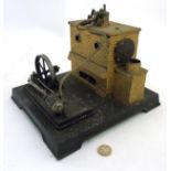 Stationary Engine: a tinplate scale oil fired steam powered wheel, 8 3/4" wide,