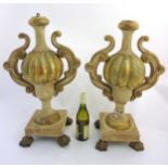 18thC lamps : an impressive pair of Regency gilt and cream decorated wood and gesso , melon urn ,