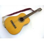 Musical Instruments : A mid-20thC 3/4 size classical guitar by Musima (GDR) of cedar construction,