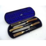 Local interest : A cased antler handled 3-piece carving set comprising knives forks and steel.