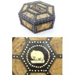 A Sri lanken / cylon hexaginal quill work box with ebony and bone detail and opening to reveal the