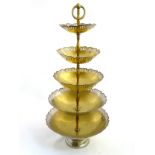 A large brass and silver plated table centre piece,