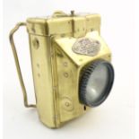 A signed brass cased hand held 'Kent, Police' early torch with focusing lens.