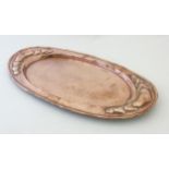 Art and Crafts Decorative metalware : An embossed and plannished large oval butlers tray with heart