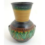 Scandinavian Studio Pottery: A Swedish vase by Ekeby, Uppsala, with round body and tall flared neck,