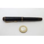 A vintage Mont Blanc draughtsman's? pen, having black finish with gilt detail,