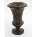 A turned marble pedestal urn standing 13 1/2" high x 8 1/2" at widest CONDITION: