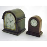 Two mantle clocks : A short arch shaped inlaid Mahogany mantle clock with 2 1/2" dial ,