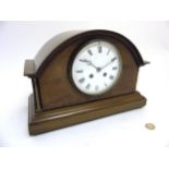 French mantel clock : a mahogany cased and checkered inlaid 8 day mantle clock having a convex 5"