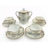 A Japanese part tea set, comprising a two handled sugar bowl and cover,