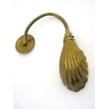 A mid - late 20thC brass wall mounted scallop shaped anglepoise lamp approx 20" long