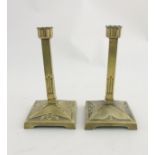 Decorative Metalware : A pair of German Art Nouveau cast brass squared candlesticks marked