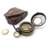 An early - mid 20thC leather cased compass by Negretti & Zambra London,