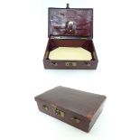 A 19thC Morocoan leather red / Burgundy writing case opening to reveal various pockets, sections,