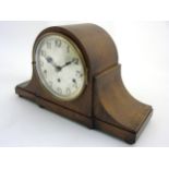 Napoleon hat mantel clock :An oak cased Kienzle 3 train mantle clock , striking on gongs ,