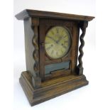 6" oak cased repeater mantel clock : an 8 day early 20thC oak case ( with Barley twist columns and