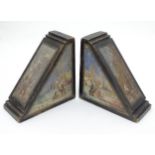 A pair of painted wooden book ends with hand painted Arabic / Islamic scenes depicting buildings,