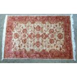 Rug / Carpet : Ziegler machine made rug beige ground with a red and gold design.