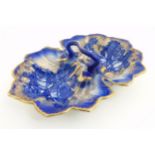 A Flow Blue Ironstone two section handled Staffordshire bowl depicting roses with gilt decoration