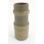 Scandinavian Studio Pottery: A tall Swedish cylindrical pot by Nittsjo, Sweden in beige/taupe tones,